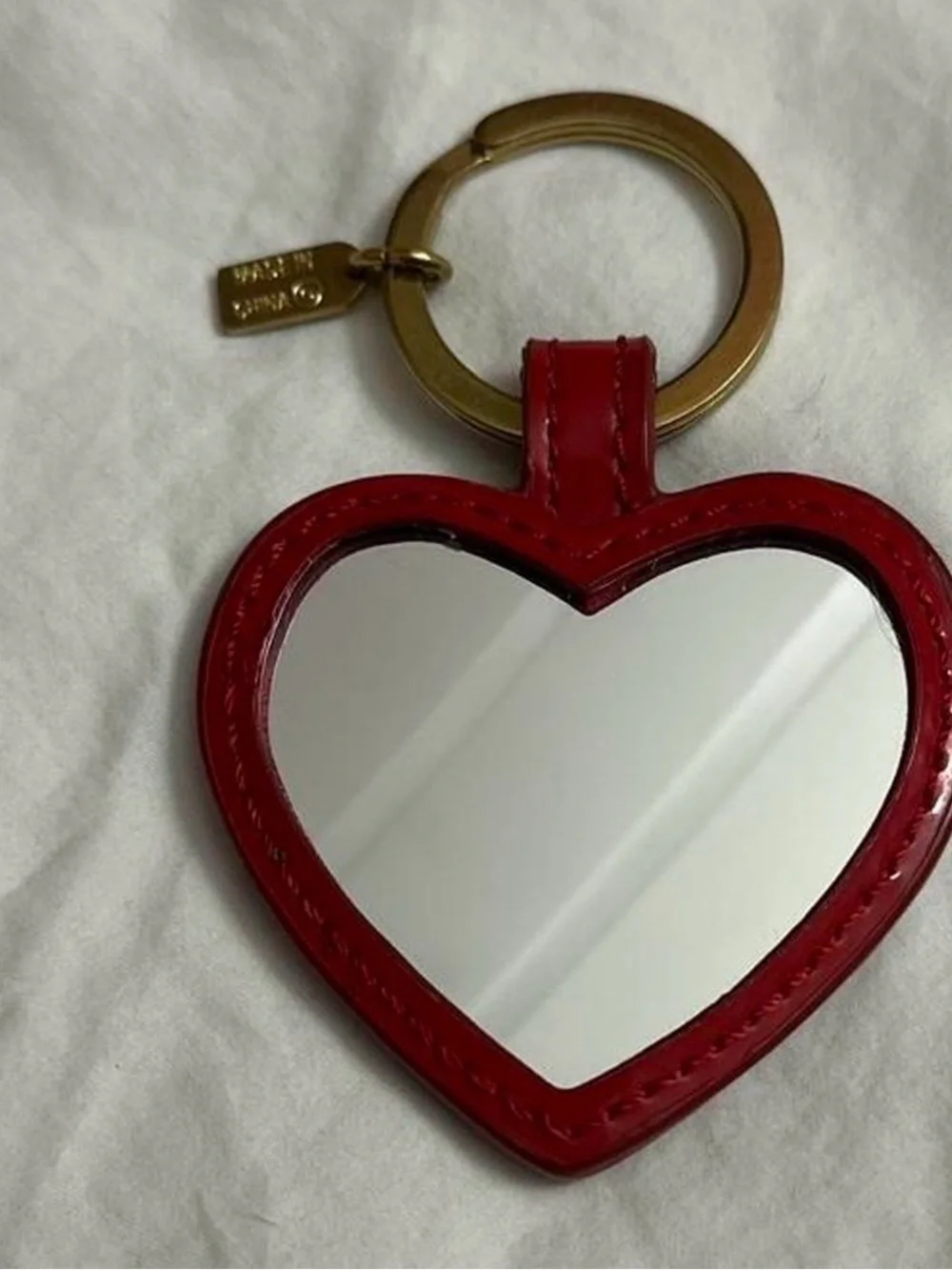 Coach glossy red
